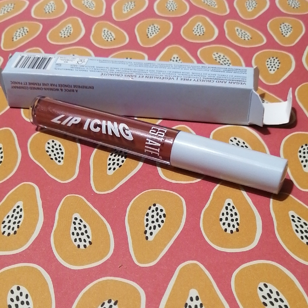 Estate Lip Icing Gloss in a light Brown tone
